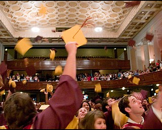 6.1.2008
Liberty High School graduates throw their hats during their commencement ceremony Sunday afternoon at Stambaugh Auditorium in Youngstown.
