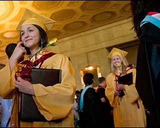 6.1.2008
Rebecca L. Illencik followed by Megan H. Kay exit Stambaugh Auditorium following Liberty High School's commencement ceremony Sunday afternoon.