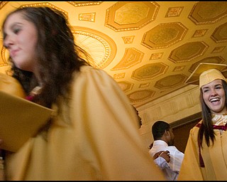 6.1.2008
Michelle Shriver (right) smiles as she exits Stambaugh Auditorium Sunday afternoon following Liberty High School's commencement ceremony Sunday afternoon.