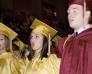 Closing the ceremony, William Allison and Katie Shaffer were completely lost in their school song. Allison appears inebriated with joy