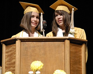 Valedictorian Maureen Sweet, left, and Salutatorian Kristen Placer broke over a century of Warren G. Harding High School commencement tradition by delivering a shared speech.