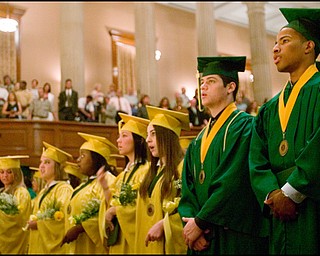 5.31.2008
George Williams (right) and Demetrios Kolitsos (left) stand with their fellow graduating seniors during the playing of the alma mater at Ursuline High School's 100th Commencement Ceremony in Stambaugh Auditorium.