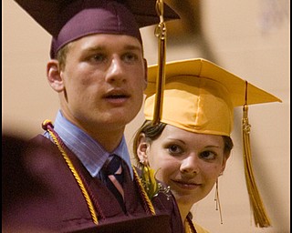 6.7.2008
Michele Leigh Hartman and Isaac Melnick stand preparing to accept their diplomas during South Range High School's Graduation at South Range High School Saturday evening.