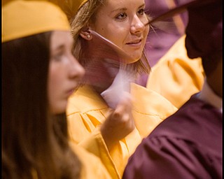 6.7.2008
Margaret Mary Yankle fans herself during South Range High School's Graduation Ceremony at South Range High School Saturday evening.