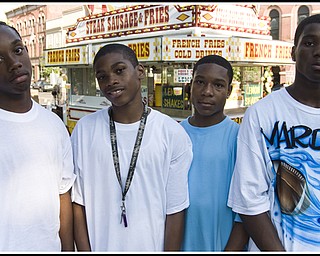 Poker faces: L-R, Jermaine Peoples, 15, Antone Perry, 13, Arrick Taylor, 14, Kenta Johnson, 13, and Mardel Manningham, 15. All four boys were joking around until the camera came out.