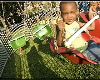 Marcus Davies, 9, on the motorized swing.