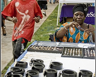Awa Thian came from Senegal by way of Cincinnati. She sold belts and necklaces at the festival.