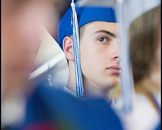 6.8.2008
Anthony DeFelice III sits among his fellow graduates during Poland Seminary High School's Commencement Ceremony for the Class of 2008 at Poland Seminary High School Field House Sunday afternoon.