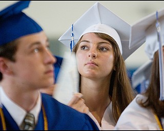 6.8.2008
Marion Alberty fans herself during Poland Seminary High School's Commencement Ceremony for the Class of 2008 at Poland Seminary High School Field House Sunday afternoon.
