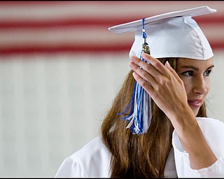 6.8.2008
Christie Baker moves her tassle from right to left signifying her graduation during Poland Seminary High School's Commencement Ceremony for the Class of 2008 at Poland Seminary High School Field House Sunday afternoon.