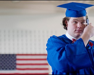 6.8.2008
Ian Burley moves his tassel from right to left signifying her graduation during Poland Seminary High School's Commencement Ceremony for the Class of 2008 at Poland Seminary High School Field House Sunday afternoon.