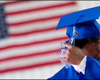 6.8.2008
Jordan DePaul flips his tassel to left side of his cap after receiving his diploma during Poland Seminary's Class of 2008 commencement ceremony Sunday afternoon at the school's field house.