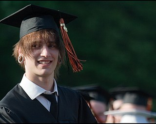 6.8.2008
Zachary Klepfer accepts his diploma during Springfield High School's Class of 2008 commencement ceremony held Sunday evening at the school's stadium.