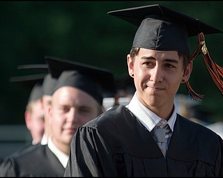 6.8.2008
Joshua Larson receiving his diploma at Springfield Local High School during the Class of 2008's graduation ceremony at the school's stadium Sunday evening.
