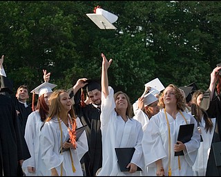6.8.2008
Jocelyn Blackson throws her hat into the air with her fellow graduates of Springfield High School following the Class of 2008's commencement ceremony held Sunday evening at Springfield High School's Stadium.