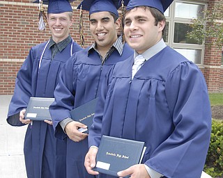 Three musketeers: Lowellville graduates, L-R, Brandon Brady, Jacob Paz Rafidi and John Lyras vow, somewhat nervously, to stick together after graduation.