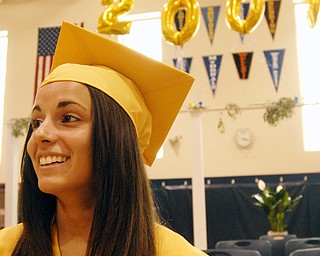 Last to leave: Lowellville graduate and National Honor Society inductee, Whitney Paulumbo, smiles for a picture.
