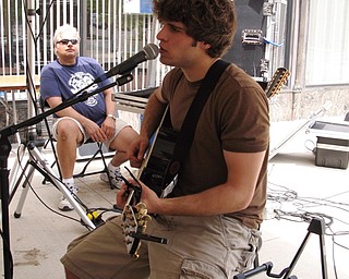 JD Eicher performs at Saturday's StreetScape