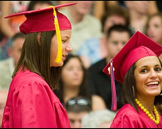 6.15.2008
Eirca Kotel (right) and Samantha Kozbial (left) wait to receive their diplomas during Austintown Fitch High School's Commencement Ceremony for the Class of 2008 held Sunday afternoon in the school's gymnasium.