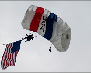 6.17.2008
Jimmy Drummond, resident and firefighter of Youngstown floats to the field to start off the Mahoning Valley Scrappers' season opener at East Wood Field, Tuesday evening. Drummond has been sky diving since 1993 and holds the title of National Accuracy Champion.