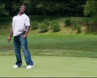 6.24.2008
Vernon Davis, tight end for the San Francisco 49ers reacts after just missing a putt at the DeBartolo Golf outing at the Youngstown Country Club, Tuesday morning.