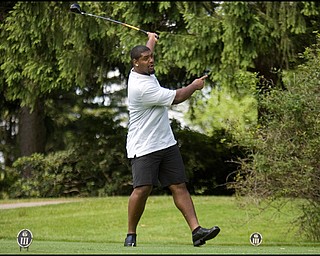 6.24.2008
Kentwan Balmer, first round draft pick for San Francisco 49ers, tees off from the 15th hole at the DeBartolo Golf outing at the Youngstown Country Club, Tuesday morning.