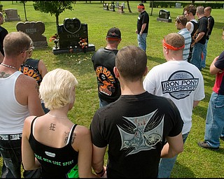 7.6.2008
Motorcyclists pay their respects at the grave of Matthew Adam Tynal who passed away from a motorcycle accident on July 1, 2007.