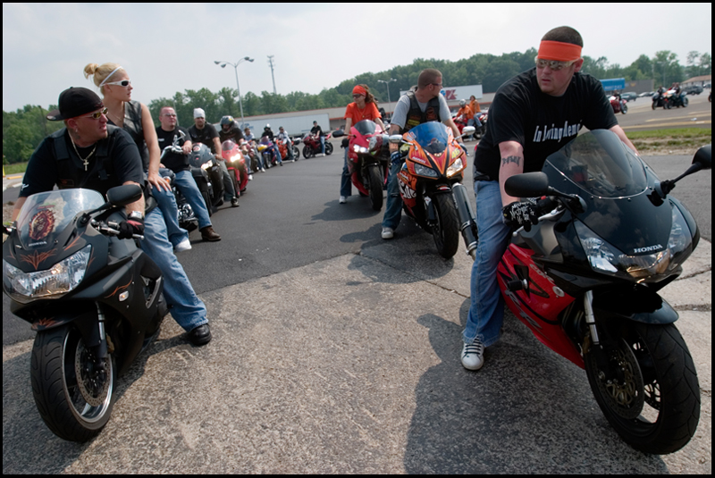 7.6.2008
Dan Sinclair and Krystal Hamm (left) and Joe Mix (right) prepare to leave a parking lot along Mahoning Ave in Austintown with 45 other motorcycles embarking on a ride in honor of Matthew Adam Tynal who died in a motorcycle accident on July 1, 2007.
