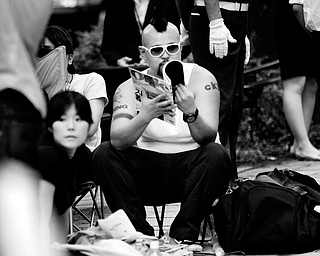 "Butch" sits in a camping chair in line outside Japanese mobile carrier Softbank's flagship store in Tokyo's Omotesando shopping district Wednesday, July 9, 2008 before the first sales of Apple's iPhone in Japan Friday. Gadget lovers are already camped out at a Tokyo store ahead of the global rollout Friday of the next-generation iPhone. But whether the Japan debut for the hit cell phone will score with anyone beyond a niche crowd remains to be seen, analysts say.