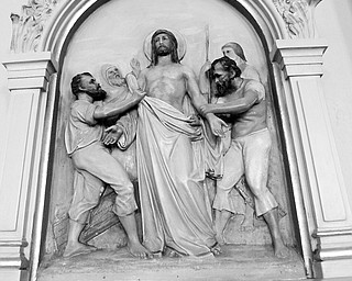 One of the reliefs - station of the cross along the walls at Mt Carmel - 100th anniversary of Our Lady of Mount Carmel Church.