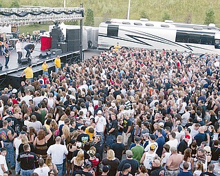 A large crow d was on hand as the band Finger 11 performs an outdoor concert at the Chevrolet Centre Tuesday. Pix taken from roof of Chevy Centre.