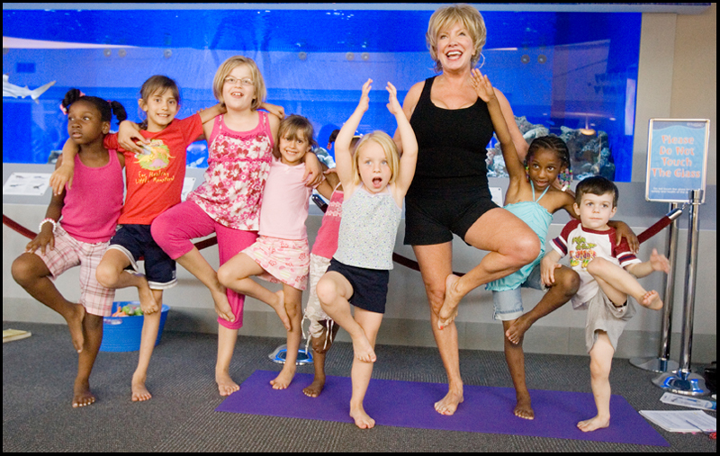 7.17.2008
Judy Kay, of Howland, practices yoga with participating children during Yoga for Kids, a summer workshop at Eastwood Mall offered offered by the Art Outreach Gallery and sponsored by American Gladiators Fitness Center. "It has totally changed my life {(I began)} feeling better about life and myself, its keeping me young" says Kay of yoga which she has taught for 35 years, "thats what i want to give back to the kids and you don't need any special equipment you can do it on your own."
