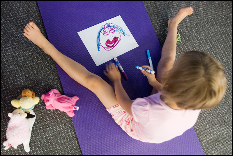 7.17.2008
Zoe Bowman (7), of Vienna, draws a picture of how she feels following a meeting of the Yoga for Kids Workshop at Eastwood Mall put on by the Art Outreach Gallery and sponsored by American Gladiators Fitness Center.
