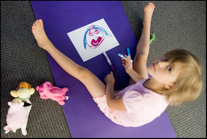 7.17.2008
Zoe Bowman (7), of Vienna, draws a picture of how she feels following a meeting of the Yoga for Kids Workshop at Eastwood Mall put on by the Art Outreach Gallery and sponsored by American Gladiators Fitness Center.

