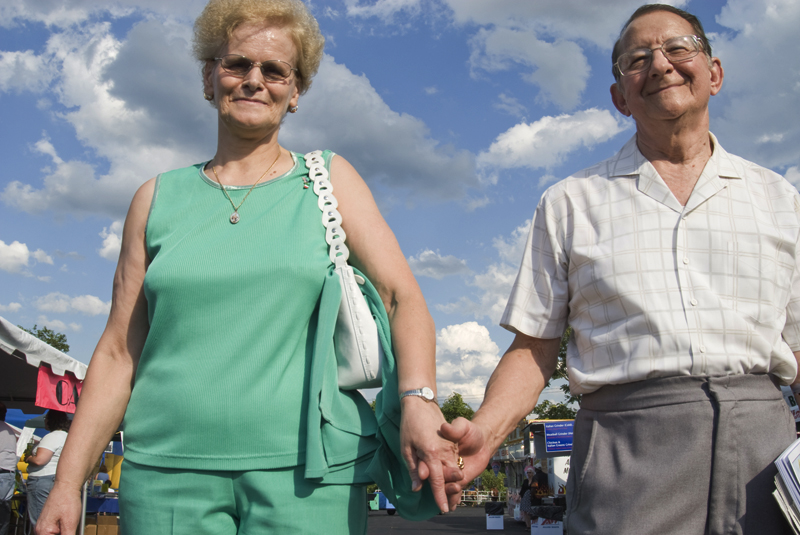 Dating: Rina Cavano of Poland and Ed Chermansky of Youngstown hold hands at the Italian Festival at Mt. Carmel Church in Youngstown, OH. Thursday, July, 24, 2008. Daniel C. Britt. 