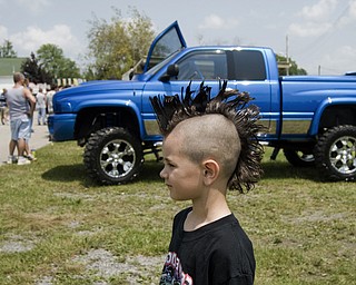 Isaac Collins, 6, of Hammondsville models his mohawk cut in preparation for the Jeep Festival at the Canfield Fair Grounds on Sunday, July 27, 2008. Daniel C. Britt.