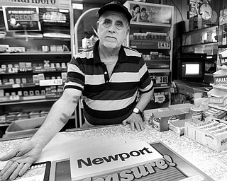 7.25.2008
Ahmed Dayem, who has been working at J&D Supermarket for over 2 years, displays wounds he sustained when a masked gunmen entered the store demanded money from the drawer and after receiving it continued to discharge two rounds. One shot was directed at Dayem's feet and caused minor injuries to both his right arm and right leg.
Geoffrey Hauschild
