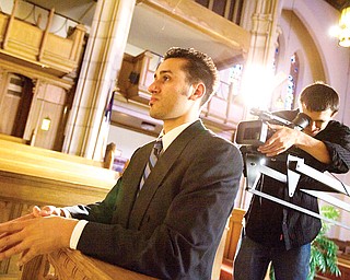 7.21.2008
Jason Melidona, a.k.a. rapper "Jay Mel" of Niles, is filmed by Videographer, Dan Mizicko, a resident of Vienna and senior at YSU majoring in Telecommunications, at Trinity United Methodist Church during shooting for the music video of his song, "This Letter."
Geoffrey Hauschild