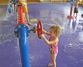 Lena Dill, 2, daughter of Valerie and Dustin Dill of Campbell, plays at an indoor water park in Niagara Falls.