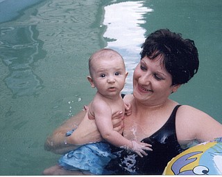 Nick Geraci's first swim at age 3 months, with his mother, Kerry, at the home of his grandparents. Son of Tony and Kerry Geraci, Boardman. (goes with shot from this summer)