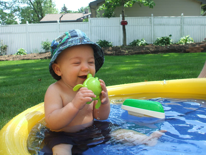 This is our 8 month old son, Patrick enjoying his long summer days in the pool. Phillip and Tricia Dell of Austintown