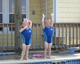 A.J. Barber and his cousin Keaton Mayhew salute before going in the water. Charisse Mayhew of Boardman is Keaton's mother.