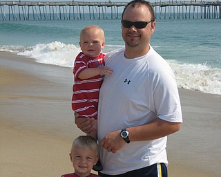 Nick, Keaton and Kaden Mayhew of Boardman enjoy some beach time at the Outer Banks in North Carolina.