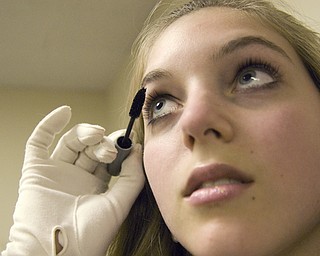 Candace Campana, 17, of Struthers preps for the Italian Queen pageant at the Downtown Italian Festival in Youngstown on Friday, August 1, 2008. Daniel C. Britt.