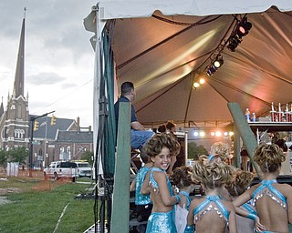 Savannah Berk, 9, of Warren glances toward the camera before performing with Natalie's Dance Troupe at the Warren Italian Festival Thursday, August 7, 2008. Daniel C. Britt.