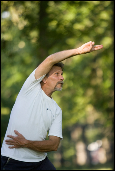 7.31.2008
Ed Istnick Jr., of the North Side, has been practicing Tai Chi for about 15 years. Istnick warms up before doing group sets in Wick Park.
