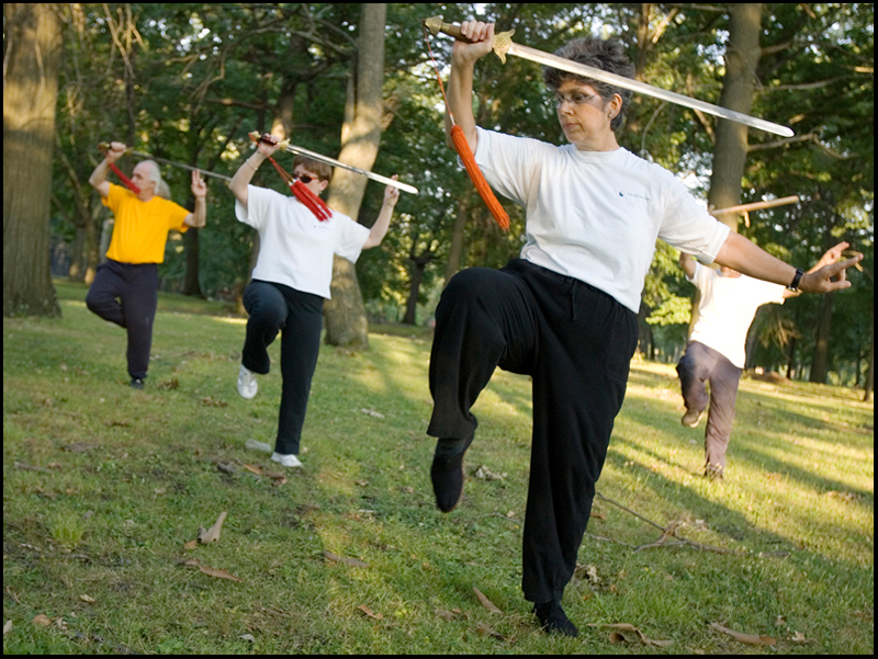7.31.2008
(left-right)
Ed Hallahan, Evaline Abram-Diroll, Marie Lew, and Ed Istnick Jr., all residents of the North Side, practice Tai Chiin Wick Park.
