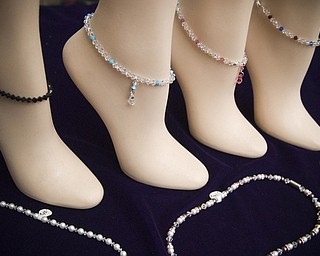 Casey Crystal of Pittsburgh, PA had on display handmade anklets at the Shaker Craft festival in Beaver Sunday, August 10, 2008. Daniel C. Britt.