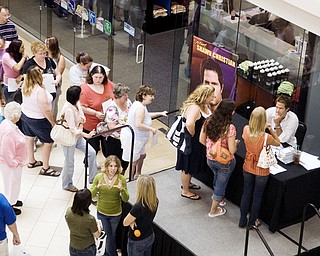 STEP RIGHT UP: Christian signed hundreds of autographs in Niles on Sunday.