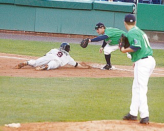 PICKOFF ATTEMPT: Scrappers pitcher, P.J. Zocchi, right, watches as first baseman Zach Booker, center, tries to tag out Andy Simunic of the Tri-City ValleyCats at first base during Sunday's game at Eastwood Field.